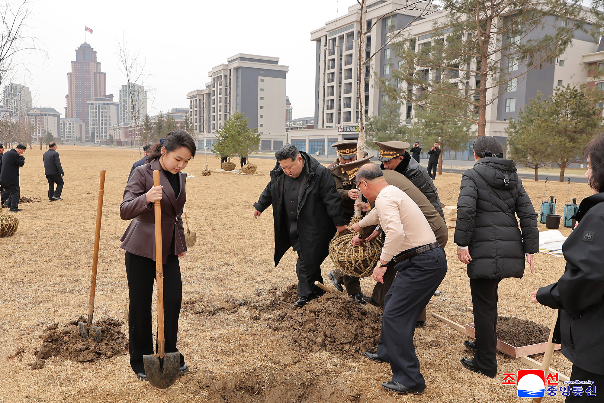 Respected Comrade Kim Jong Un plants trees in Saeppyol Street on Tree-planting Day