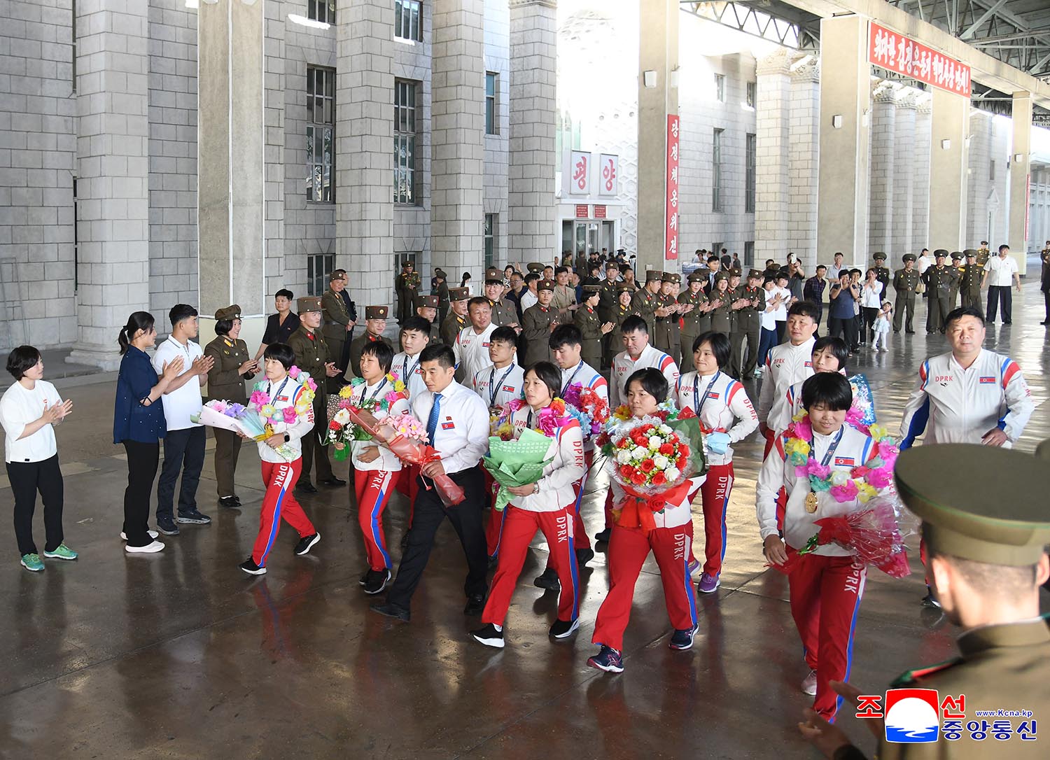 DPRK players return home